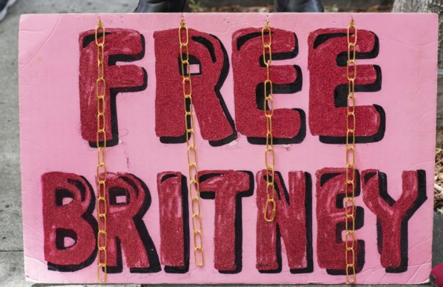 A placard is pictured in front of the courthouse during the FreeBritney movement rally in support of musician Britney Spears following a conservatorship court hearing in Los Angeles, California on April 27, 2021. - Britney Spears has requested to speak in court in the legal battle over her father's control of her affairs, her attorney said April 27, 2021. The 39-year-old US pop singer is the subject of a "FreeBritney" online campaign from her adoring fans who believe the guardianship in place since 2008 should be ended, but has rarely spoken directly about the issue herself.
