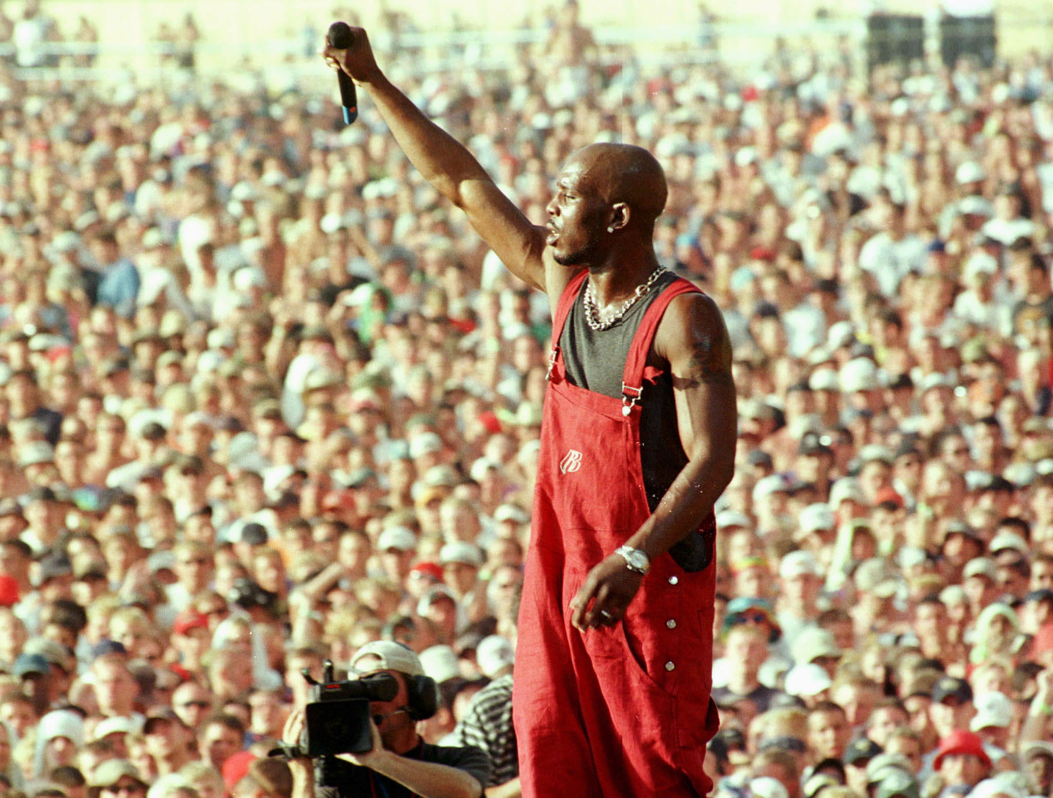 Earl Simmons, better known as rap musician DMX, performs on the main stage at the Woodstock music and arts festival in Rome, New York, U.S. July 23, 1999. REUTERS/Joe Traver/File Photo