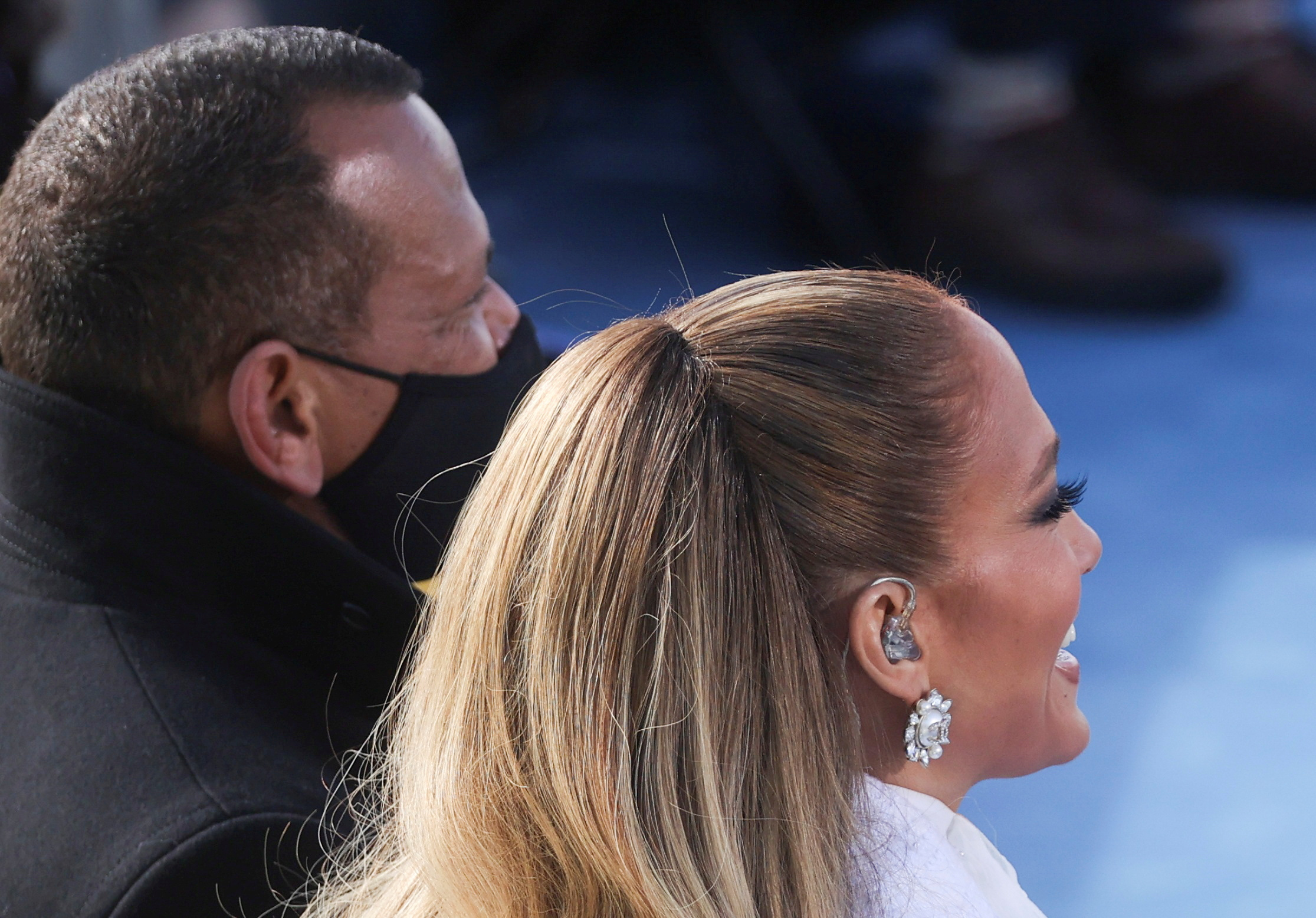 Singer Jennifer Lopez smiles next to Alex Rodriguez during the inauguration of Joe Biden as the 46th President of the United States on the West Front of the U.S. Capitol in Washington, U.S., January 20, 2021. REUTERS/Jonathan Ernst/Pool