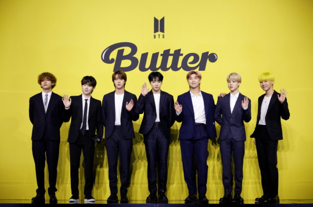 Members of K-pop boy band BTS pose for photographs during a photo opportunity promoting their new single 'Butter' in Seoul, South Korea, May 21, 2021. REUTERS/Kim Hong-Ji