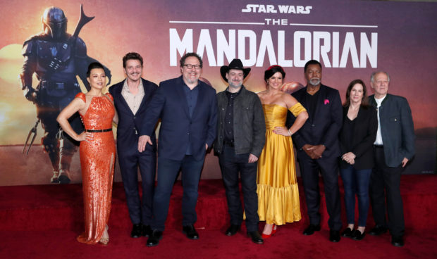 Creator Favreau, President of Lucasfilm Kennedy, executive producer Filoni pose with cast members Wen, Pascal, Carano, Weathers and Herzog at the premiere for the television series "The Mandalorian" in Los Angeles