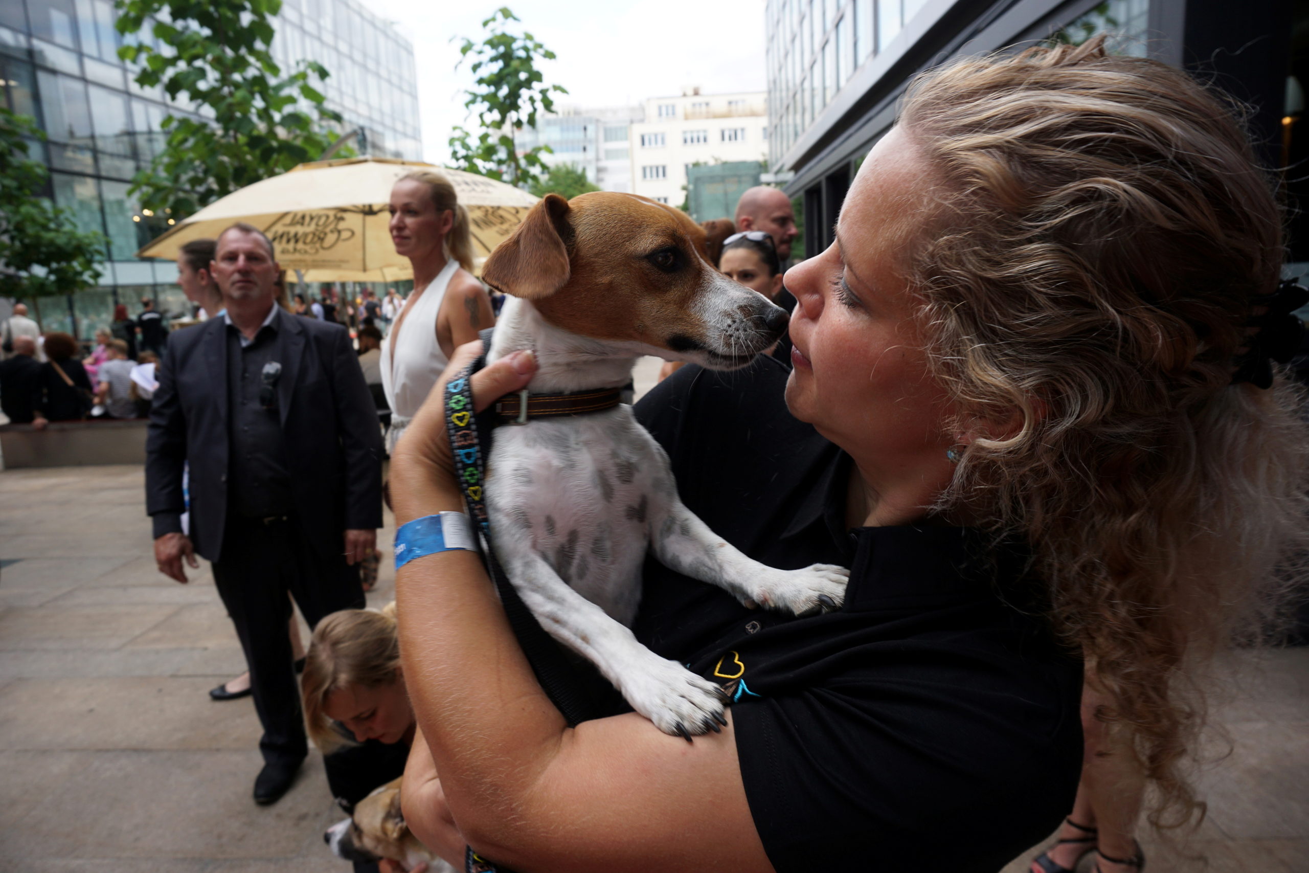 A dog keeper holds a dog actor before "Gump" premiere in Prague, Czech Republic July 21, 2021. Picture taken July 21, 2021.