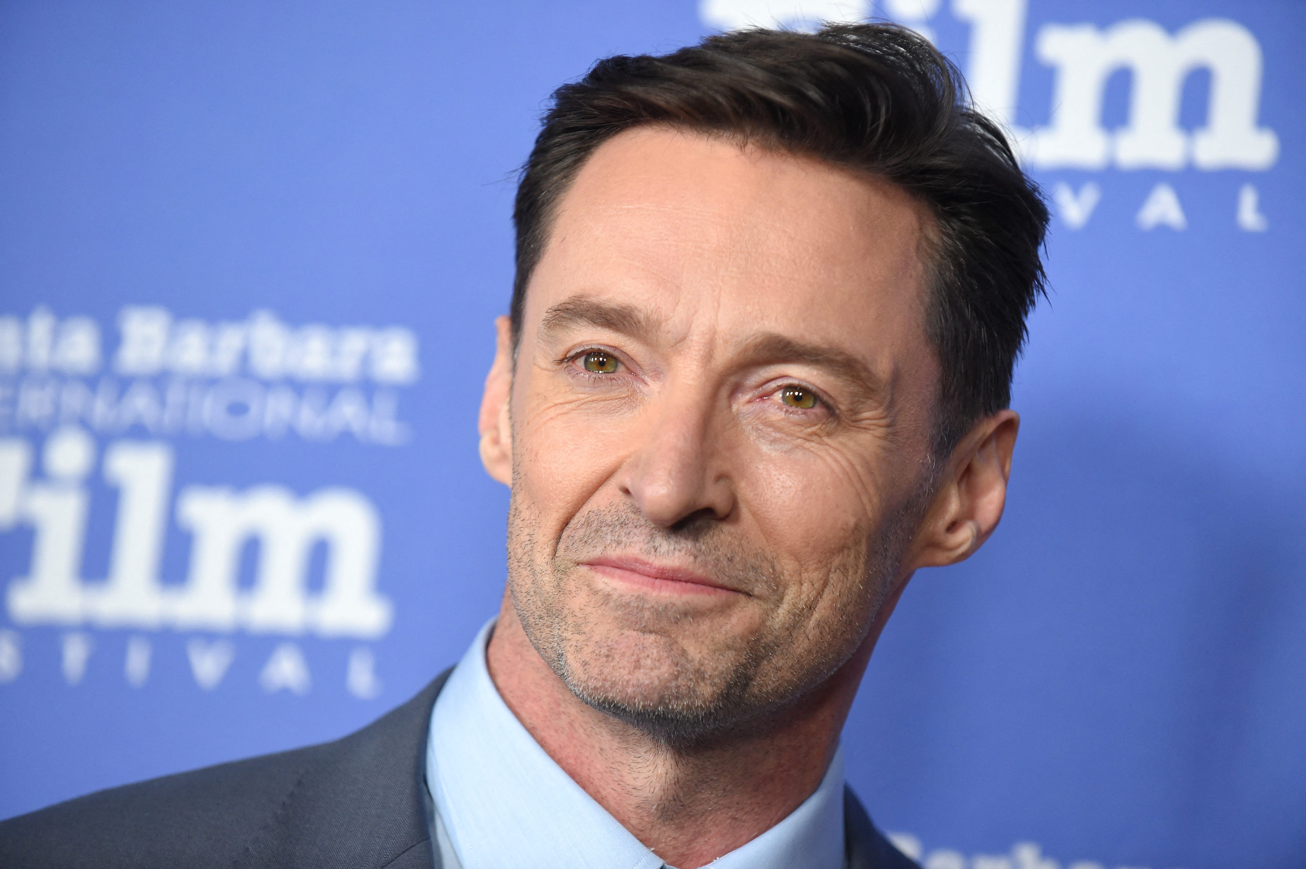 In this file photo taken on November 19, 2018 Australian actor Hugh Jackman attends the 34th annual Santa Barbara International Film Festival in Santa Barbara, California. - Hugh Jackman helped pioneer the superhero sequels that dominate modern megaplexes, but the former "X-Men" actor leapt at the chance to star in something more rare these days -- a totally original sci-fi from a major studio, in "Reminiscence." The Warner Bros film, out on Friday, comes from the creators of TV smash hit "Westworld," and imagines a dystopian near-future Miami in which a rising ocean has flooded the streets. (P