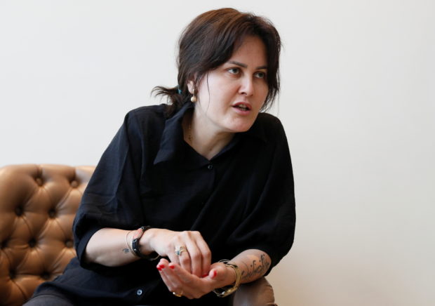 Afghan filmmaker Sahraa Karimi speaks during an interview with Reuters in Kyiv