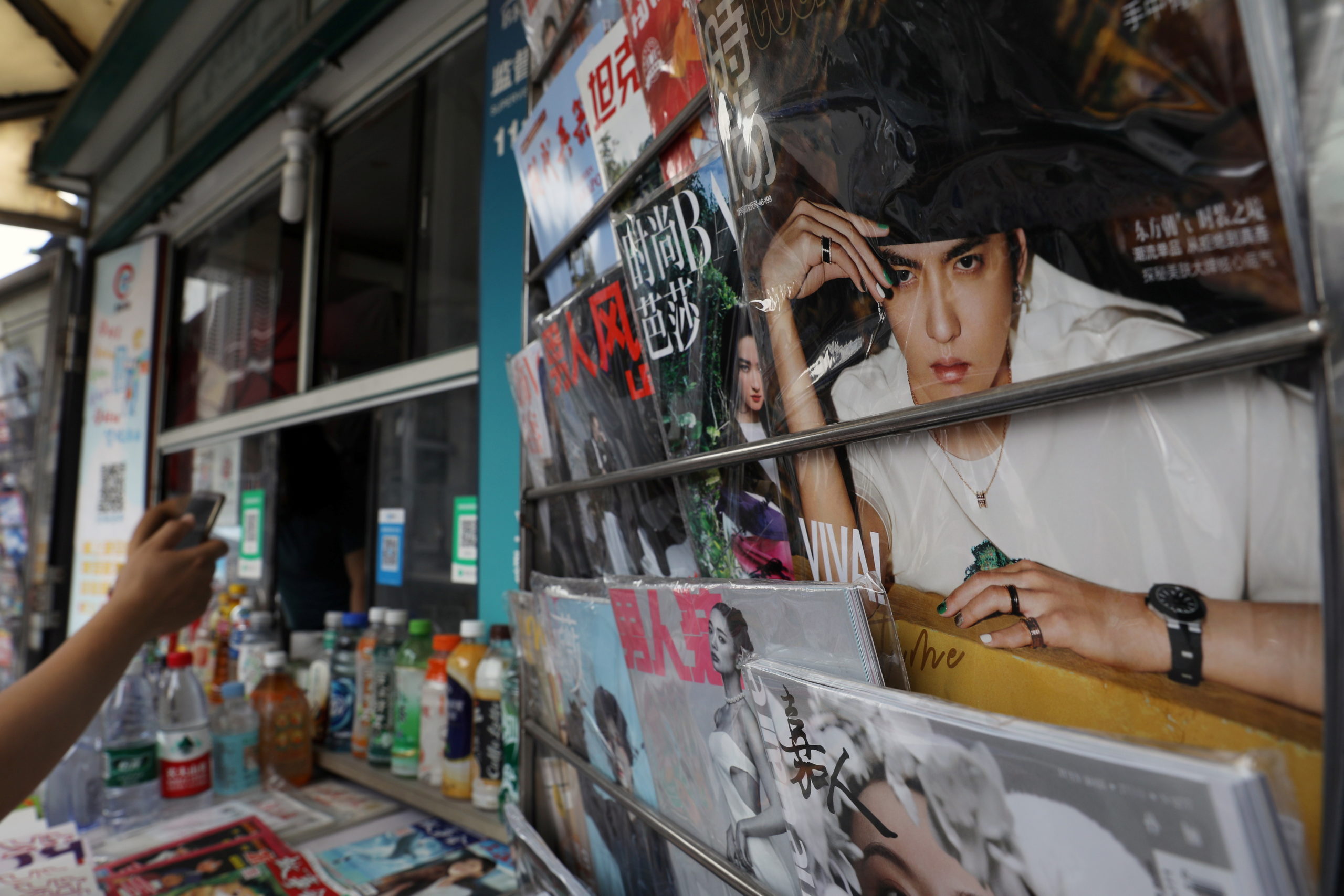 Singer-actor Kris Wu is seen on the cover of a fashion magazine at a newsstand in Beijing, China July 20, 2021. 