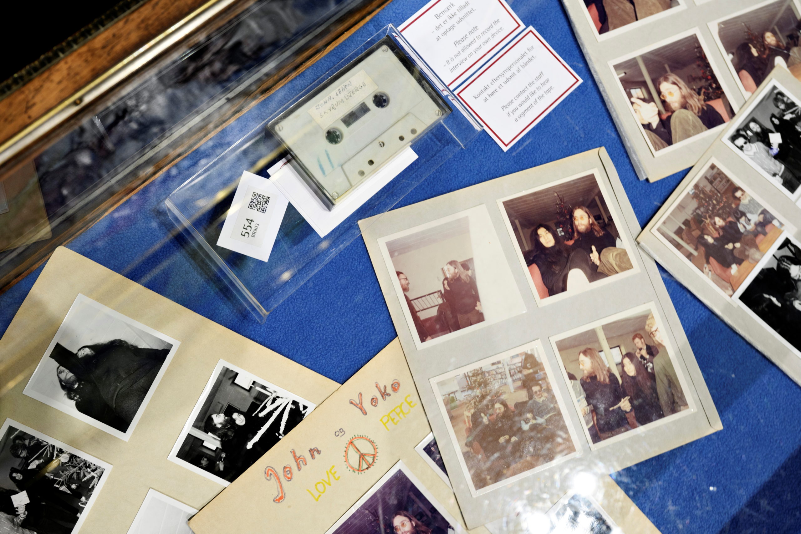 View of items at an auction of polariods and a cassette with the recording of Danish schoolboys' interviews with John Lennon and Yoko Ono during the couple's winter stay in Thy, Jutland, Denmark in 1970 at Bruun Rasmussen Auction House in Copenhagen, Denmark, September 28, 2021. Ritzau Scanpix/Philip Davali via REUTERS