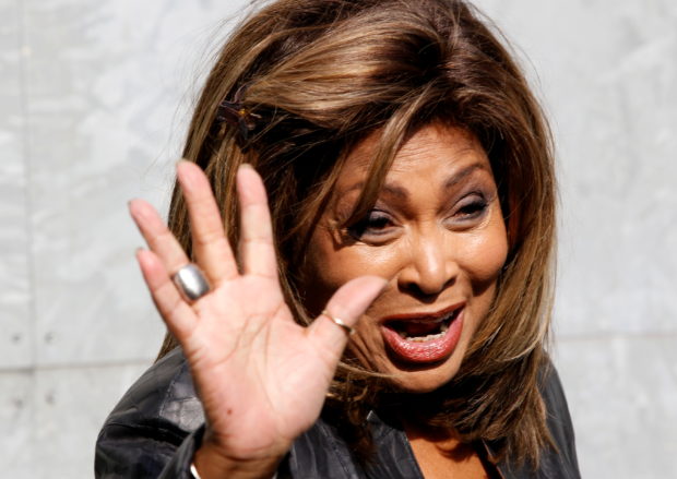 U.S. pop singer Tina Turner waves during photocall before the Emporio Armani  Autumn/Winter 2011 women's collection show at Milan Fashion Week