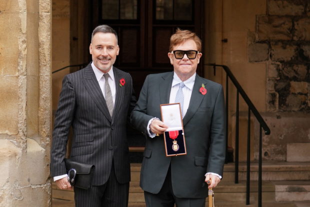 Elton John receives Order of the Companions of Honour in Windsor