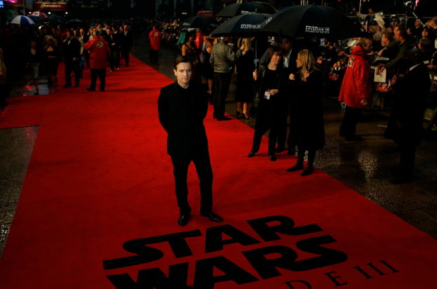 FILE PHOTO: British actor Ewan McGregor poses as he arrives for the UK premiere of the Star Wars film "Revenge of the Sith" in London's Leicester Square May 16, 2005. REUTERS/Dylan Martinez/File Photo