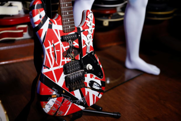 An Eddie Van Halen Fender “Frankenstrat” guitar that he played sits on display at Julien’s Auctionsat Julien’s auction at Hard Rock Cafe in New York City
