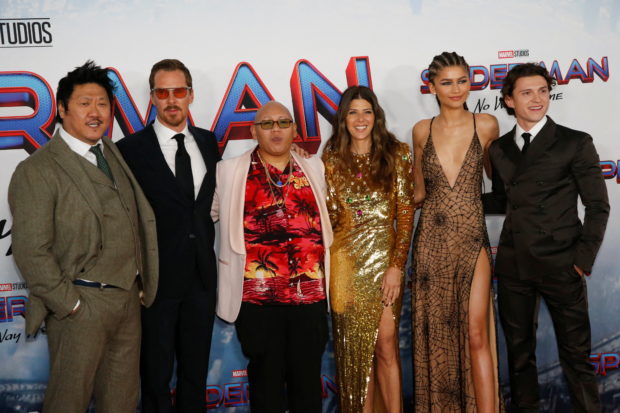 Cast members Benedict Wong, Benedict Cumberbatch, Jacob Batalon, Marisa Tomei, Zendaya and Tom Holland pose for a photograph as they attend the premiere for the film Spider-Man: No Way Home in Los Angeles, California, December 13, 2021. REUTERS/Mario Anzuoni