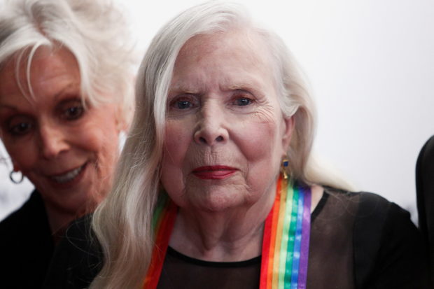 FILE PHOTO: Singer-songwriter Joni Mitchell arrives at the red carpet of the 44th Kennedy Center Honors, at the John F. Kennedy Center for the Performing Arts in Washington, U.S, December 5, 2021. REUTERS/Tom Brenner