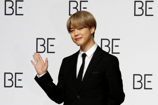  K-pop boy band BTS member Jimin poses for photograph during a news conference promoting their new album "BE(Deluxe Edition)" in Seoul, South Korea, November 20