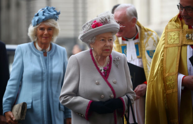 FILE PHOTO: Britain's Queen Elizabeth and Camilla, Duchess of Cornwall, arrive at Westminster Abbey in London, Britain October 15, 2019. REUTERS/Hannah McKay