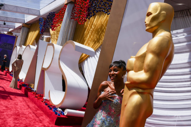 Saniyya Sidney poses on the red carpet during the Oscars arrivals at the 94th Academy Awards in Hollywood, Los Angeles, California, U.S., March 27, 2022. REUTERS/Mike Blake