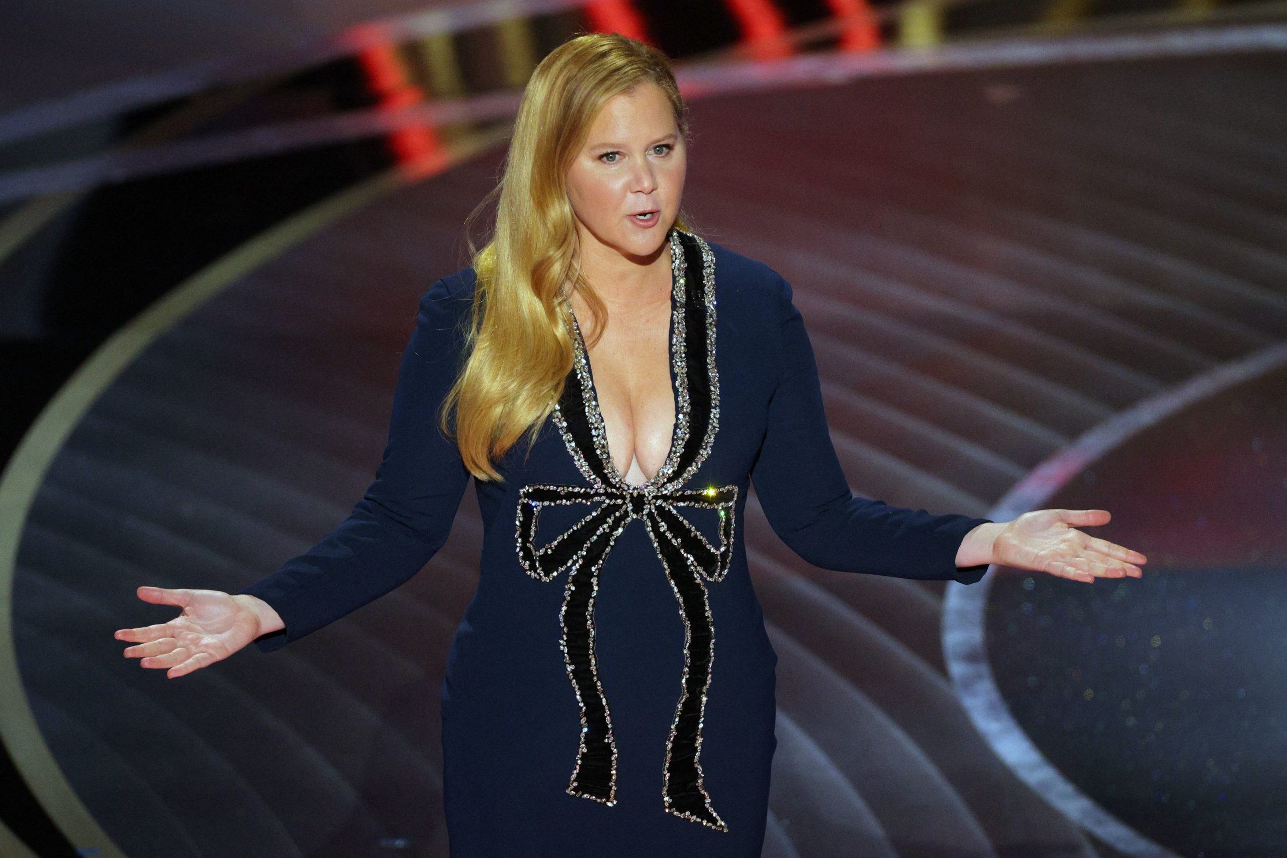 Co-host Amy Schumer speaks to the audience at the 94th Academy Awards in Hollywood, Los Angeles, California, U.S., March 27, 2022. REUTERS/Brian Snyde