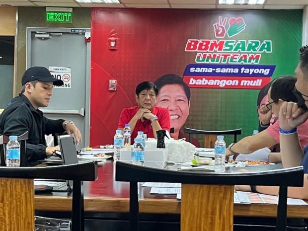 Presidential frontrunner Bongbong Marcos in a studio for a commercial shooter