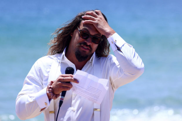 American actor and environmental activist Jason Momoa makes an appearance at a Portuguese Carcavelos beach ahead of the United Nations Ocean Conference in Lisbon. STORY: On and off screen, ‘Aquaman’ star Momoa fights for oceans