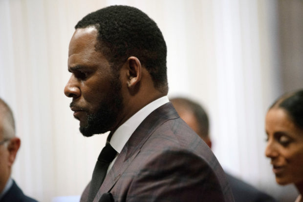 FILE PHOTO: R. Kelly appears for a hearing at Leighton Criminal Court Building in Chicago, Illinois, U.S., June 26, 2019. E. Jason Wambsgans/Chicago Tribune/Pool via REUTERS