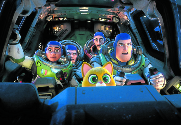Buzz (right, voiced by Evans) and Sox (foreground, voiced by Peter Sohn) with (from left) Izzy (Keke Palmer), Darby (Dale Soules) and Mo (Taika Waititi)
