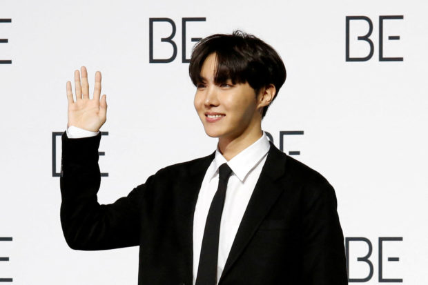 K-pop boy band BTS member J-hope poses for photograph during a news conference promoting their new album "BE(Deluxe Edition)" in Seoul, South Korea, November 20, 2020. REUTERS/Heo Ran/File Photo