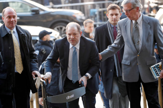 FILE PHOTO: Harvey Weinstein arrives at New York Criminal Court for another day of jury deliberations in his sexual assault trial in the Manhattan borough of New York City, New York, U.S., February 24, 2020. REUTERS/Lucas Jackson