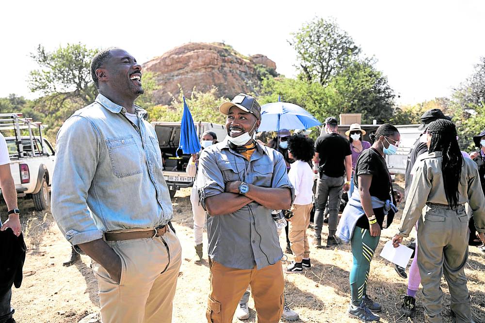 Producer Will Packer (right) with Elba