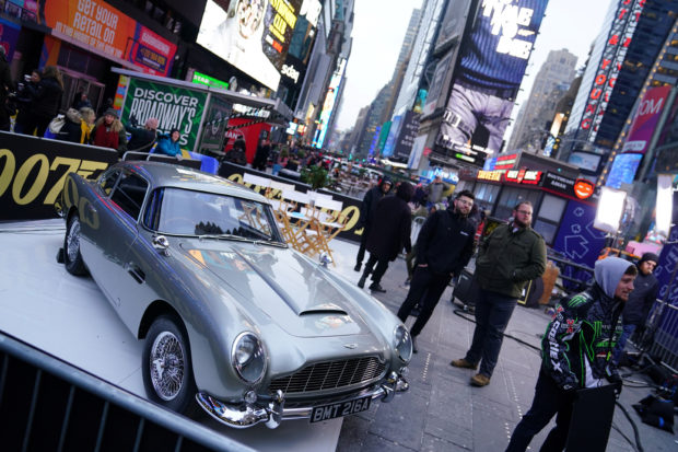 FILE PHOTO: An Aston Martin DB5 is pictured during a promotional appearance on TV in Times Square for the new James Bond movie "No Time to Die" in the Manhattan borough of New York City, New York, U.S., December 4, 2019. REUTERS/Carlo Allegri