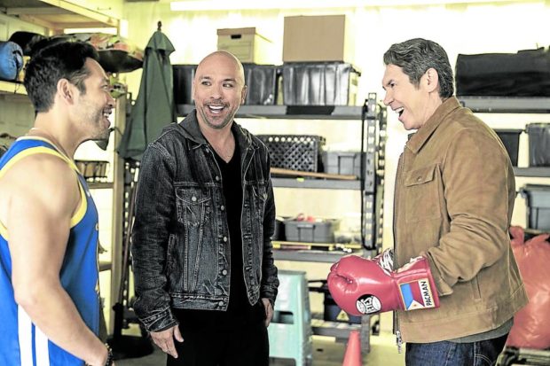 Eugene Cordero, Jo Koy, and Lou Diamond Philips in Easter Sunday. STORY: Jo Koy on how Steven Spielberg helped him bring ‘Easter Sunday’ to life