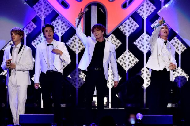 INGLEWOOD, CALIFORNIA - DECEMBER 06: (L-R) Suga, Jin, Jungkook, and RM of BTS perform onstage during KIIS FM's Jingle Ball 2019 presented by Capital One at The Forum on December 06, 2019 in Inglewood, California. Amy Sussman/Getty Images/AFP (Photo by Amy Sussman / GETTY IMAGES NORTH AMERICA / Getty Images via AFP)