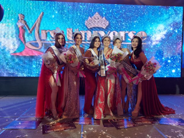 Mrs. Universe Philippines Veronica Yu (third from right) is bound for South Korea, together with her fellow winners (from left) Michelle Solinap, Jeannie Jarina, Gines Angeles, Lady Chatterly Sumbeling, and Jessa Macaraig. /ARMIN P. ADINA