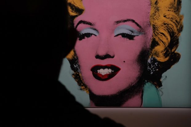Andy Warhol’s 1964 ‘Shot Sage Blue Marilyn.’displayed during a press preview March 21, 2022 in New York. - The iconic Andy Warhol silk-screen portrait of Hollywood starlet Marilyn Monroe is headed to Christie’s in New York later this spring for $200 million—a record asking price for any artwork at auction. (Photo by TIMOTHY A. CLARY / AFP)