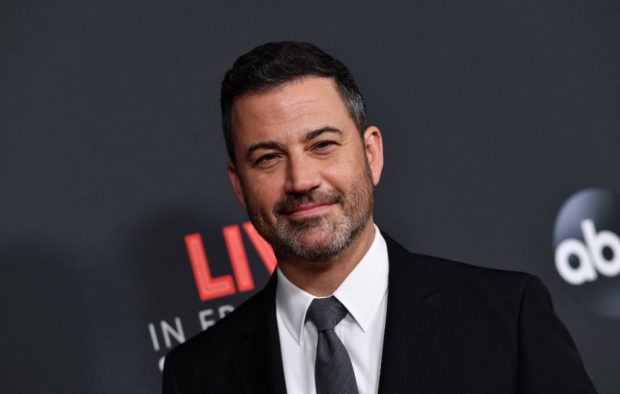 (FILES) In this file photo taken on August 07, 2019 US television host Jimmy Kimmel arrives for "An Evening With Jimmy Kimmel" at the Roosevelt hotel in Hollywood. - Late-night comedian Jimmy Kimmel will host the Oscars for a third time, organizers said November 7. 2022, as Hollywood's biggest award show tries to leave behind the controversy still swirling around its most recent edition. (Photo by Chris Delmas / AFP)