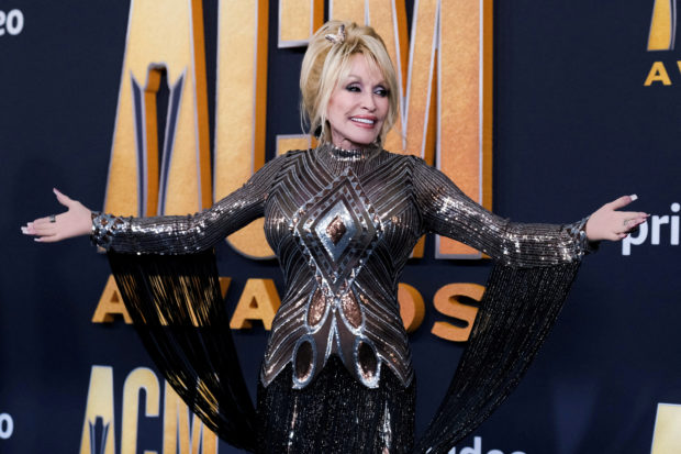 FILE PHOTO: Dolly Parton attends the 57th Annual Academy of Country Music Awards in Las Vegas, Nevada, U.S., March 7, 2022. REUTERS/Maria Alejandra Cardona/File Photo