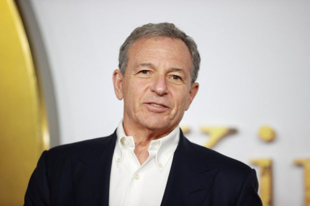 FILE PHOTO: FILEPHOTO: Executive Chairman of the Walt Disney Company, Bob Iger arrives at the world premiere for the film 'The King's Man' at Leicester Square in London, Britain December 6, 2021. REUTERS/Hannah McKay/File Photo
