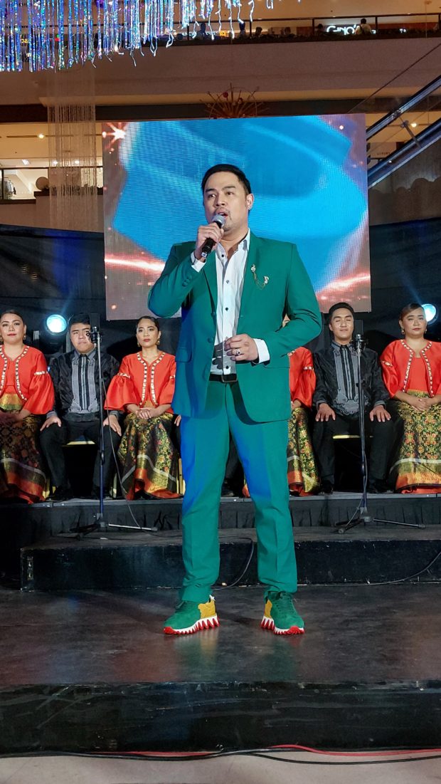 CAPTION: Jed Madela performs with the Philippine Madrigal Singers./ARMIN P. ADINA