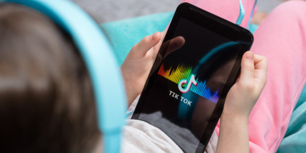 Chernigov, Ukraine, 21 of February, 2020. tablet in kids hands with Tik Tok icon on the screen. Tik Tok application icon on tablet asus screen close-up. tik tok application.; Shutterstock ID 1651757995; purchase_order: Arnaud POURPOINT; job: ; client: ETX Studio / Daily Up; other: