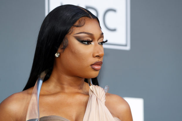 FILE PHOTO:Megan Thee Stallion arrives to attend the 2022 Billboard Music Awards at MGM Grand Garden Arena in Las Vegas, Nevada, U.S. May 15, 2022. REUTERS/Steve Marcus
