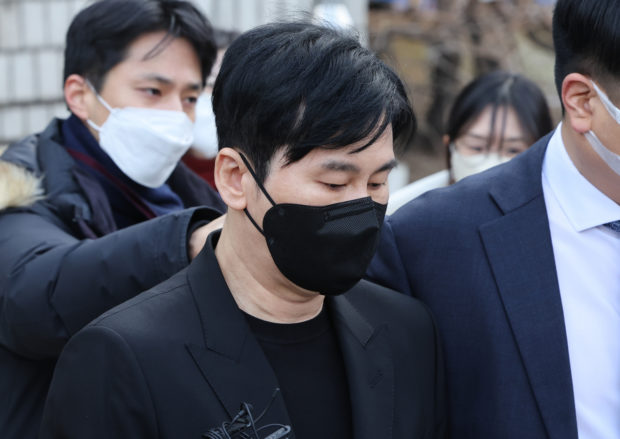 YG Entertainment's former CEO Yang Hyun-suk exits the Seoul Central District Court in Seocho-gu, Seoul, after the trial on Thursday. (Yonhap)