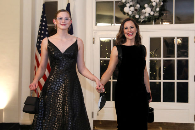 Jennifer Garner and her daughter Violet Affleck arrive for a state dinner in honor of French President Emmanuel Macron at the White House in Washington, U.S., December 1, 2022. REUTERS/Amanda Andrade-Rhoades