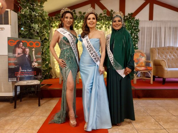 Noble Queen of the Universe Cristina Gonzales-Romualdez (center) with Noble Queen Earth Sheralene Shirata (left) and Noble Queen International Leira Buan/ARMIN P. ADINA