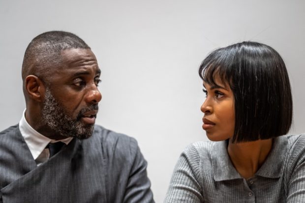 British actor Idris Elba (L) with his wife US model and activist Sabrina Dhowre Elba answer during an interview with AFP at the World Economic Forum (WEF) annual meeting in Davos, on January 16, 2023. (Photo by Fabrice COFFRINI / AFP)