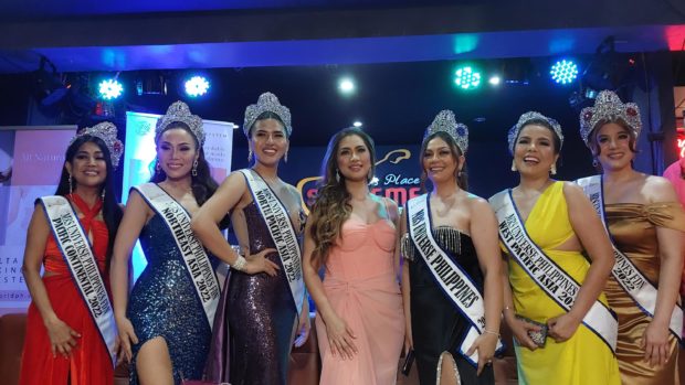 Charo Laude (center) is flanked by her Mrs. Universe Philippines queens (from left) Virginia Evangelista, Lady Chatterly Alvaro-Sumbeling, Gines Angeles, Veronica Yu, Jeanie Jarina, and Michelle Solinap./ARMIN P. ADINACharo Laude/ARMIN P. ADINA