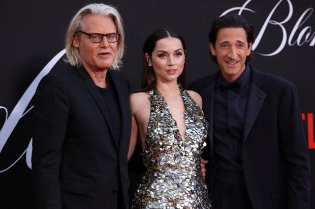 FILE PHOTO: Director Andrew Dominik and cast members Ana de Armas and Adrien Brody attend a premiere for the film Blonde at TCL Chinese Theatre in Los Angeles, California, U.S., September 13, 2022. REUTERS/Mario Anzuoni