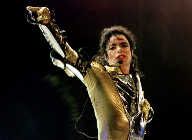 FILE PHOTO: U.S. pop star Michael Jackson performs during his "HIStory World Tour" concert in Vienna, July 2, 1997. REUTERS/Leonhard Foeger