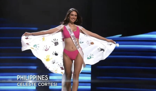 Celeste Cortesi in her swimsuit and cape. Image from Miss Universe Philippines / Instagram