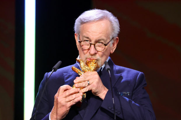 Director Steven Spielberg holds the Honorary Golden Bear Award for Lifetime Achievement at the 73rd Berlinale International Film Festival in Berlin, Germany, February 21, 2023. REUTERS/Fabrizio Bensch
