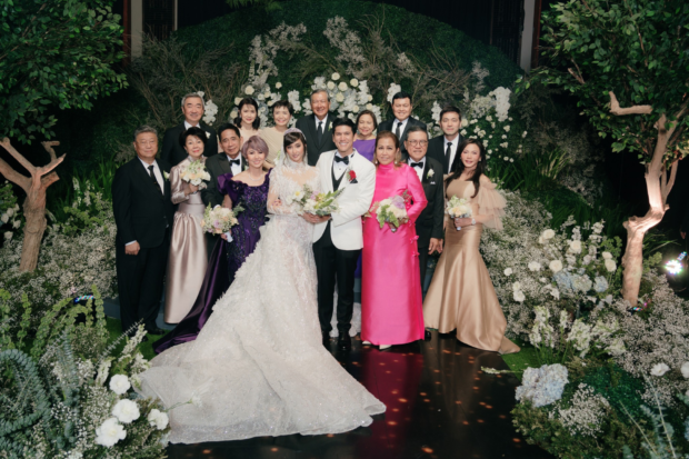Alodia Gosiengfiao and husband, businessman Christopher Quimbo, with the principal sponsors of their wedding. Image: Alodia Gosiengfiao/Facebook
