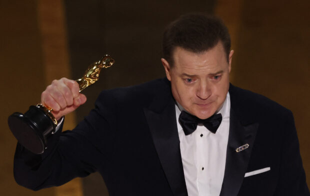 Brendan Fraser accepts the Oscar for Best Actor for "The Whale" during the Oscars show at the 95th Academy Awards in Hollywood, Los Angeles, California, U.S., March 12, 2023. REUTERS/Carlos Barria