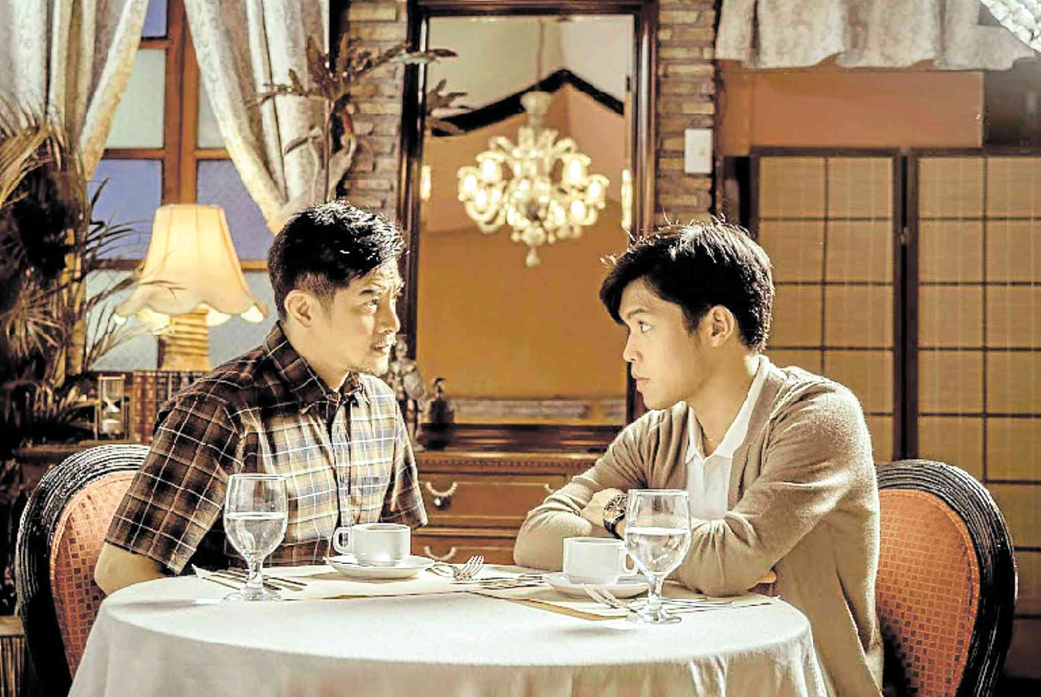 Romnick Sarmenta (left) and Elijah Canlas in “About Us But Not About Us”